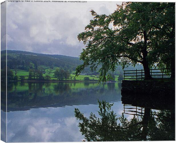 Coniston Reflections Canvas Print by Paul J. Collins