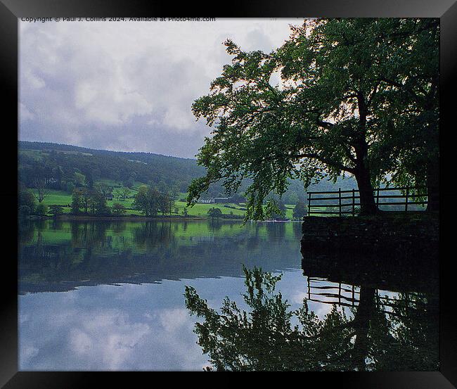 Coniston Reflections Framed Print by Paul J. Collins