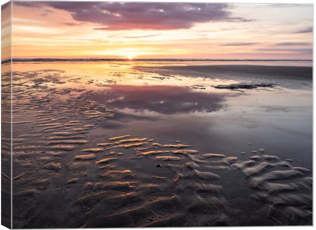 Sunset Beach reflection Canvas Print by Tony Twyman