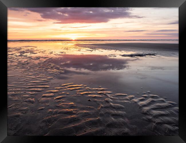 Sunset Beach reflection Framed Print by Tony Twyman