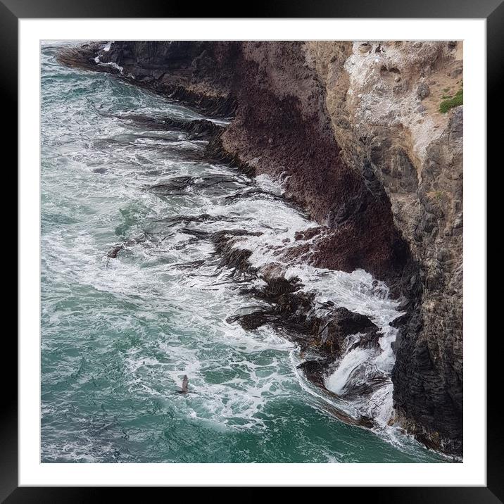 A sea waves hitting the cliff Framed Mounted Print by Junya Rawson