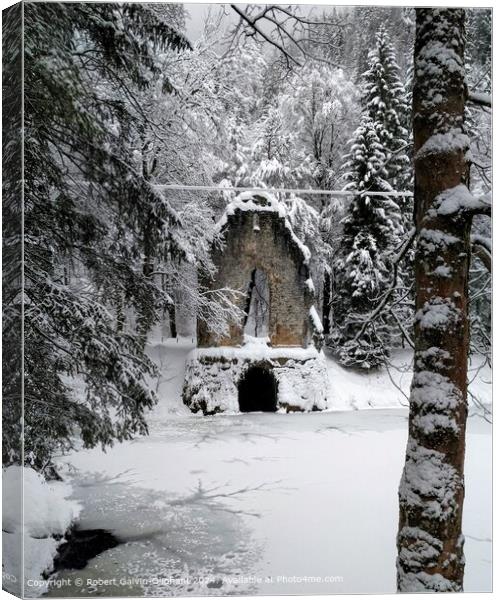 Artificial chapel ruin in snow Canvas Print by Robert Galvin-Oliphant