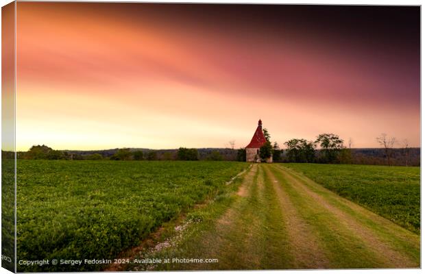 Old church in the summer field. Dobronice u Bechyne, Czech republic. Canvas Print by Sergey Fedoskin