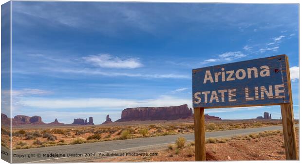Rustic Arizona State Line Sign in Monument Valley Canvas Print by Madeleine Deaton