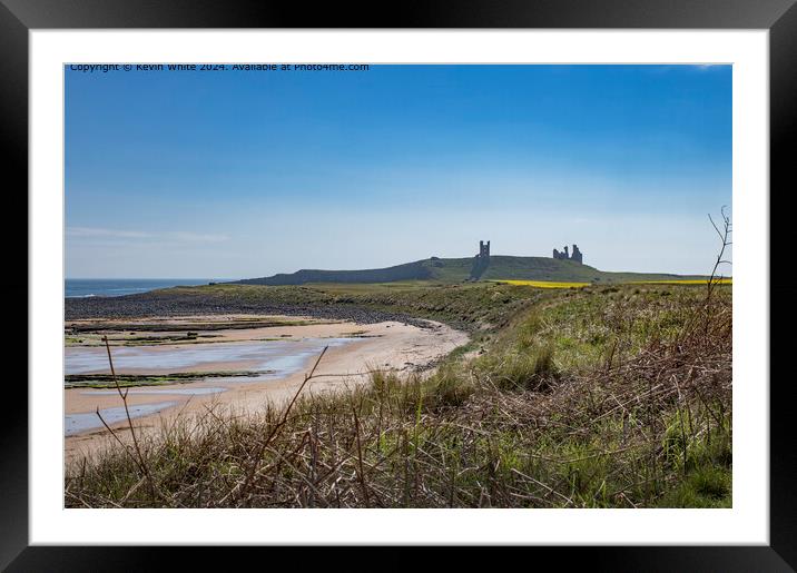 Dunstanburgh castle in the mist Framed Mounted Print by Kevin White