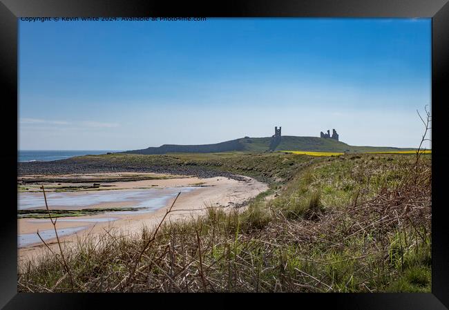 Dunstanburgh castle in the mist Framed Print by Kevin White