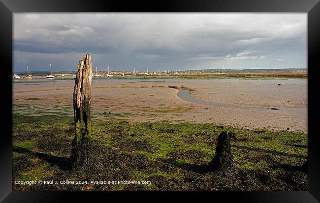Low Tide at Keyhaven Framed Print by Paul J. Collins