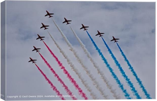 Vibrant Red Arrows Flyover Canvas Print by Cecil Owens