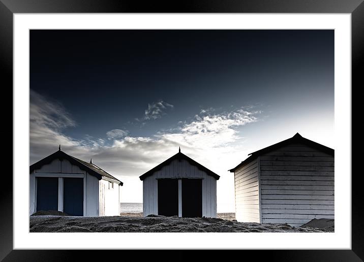 Southwold beach huts in winter Framed Mounted Print by Simon Wrigglesworth