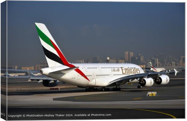 Aircraft with Skyline Contrast in Dubai. Canvas Print by PhotOvation-Akshay Thaker