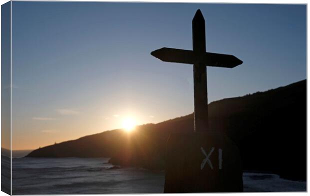 Metal cross in front of the ocean during sunrise Canvas Print by Lensw0rld 