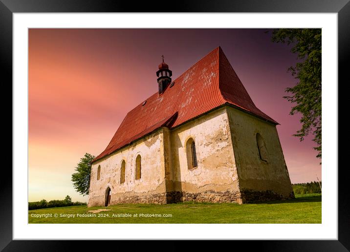 Old church in the summer field. Dobronice u Bechyne, Czech republic. Framed Mounted Print by Sergey Fedoskin