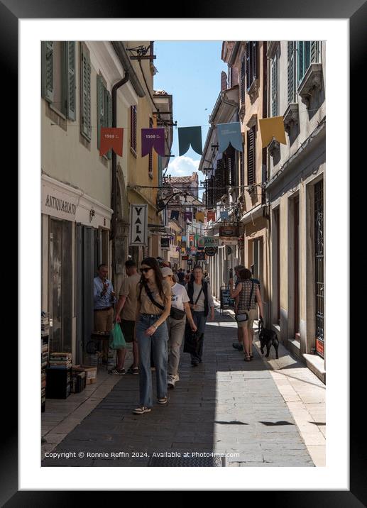 Old quaint alley in Koper bustling with tourists Framed Mounted Print by Ronnie Reffin