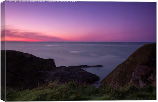 The Portknockie coastline at sunset Canvas Print by Derek Daniel