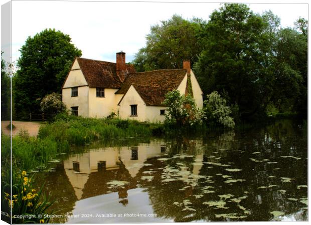 Historic Willy Lott's house with reflection in mil Canvas Print by Stephen Hamer
