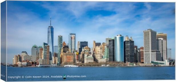 A striking capture of the New York Financial District skyline, taken from the Staten Island Ferry. Canvas Print by Colin Keown