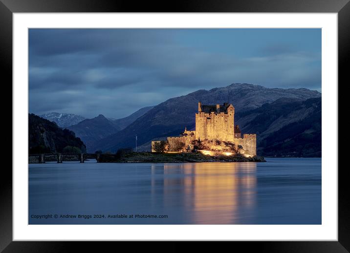 Eilean Donan Castle illuminated at night, Scotland Framed Mounted Print by Andrew Briggs