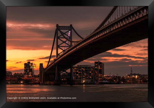 Sunset over the Benjamin Franklyn Bridge Philadelphia Framed Print by CHRIS BARNARD