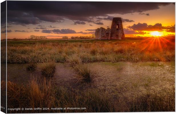 Sunset behind the ruins of St Benet's Abbey Canvas Print by Derek Griffin