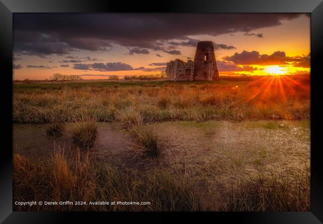 Sunset behind the ruins of St Benet's Abbey Framed Print by Derek Griffin