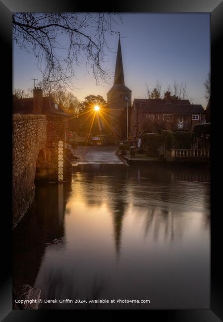 Th sunrises behind the church in Eynsford, Kent Framed Print by Derek Griffin