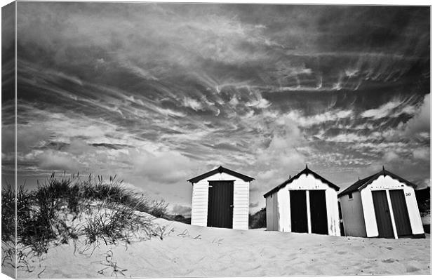 Wispy Clouds over Southwold Beach Huts 2 Canvas Print by Paul Macro