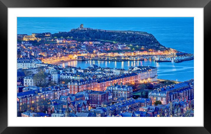 Blue hour in the Yorkshire coastal resort of Scarborough. Framed Mounted Print by Andrew Briggs