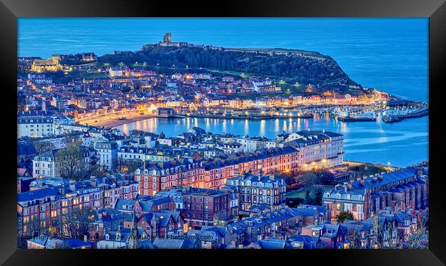 Blue hour in the Yorkshire coastal resort of Scarborough. Framed Print by Andrew Briggs