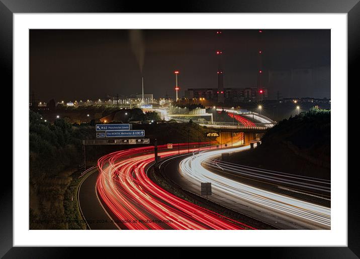 Ferrybridge light trails on the A1M in the north of England Framed Mounted Print by Andrew Briggs