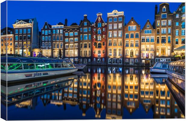 Dancing houses of Damrak at night Canvas Print by Jason Wells