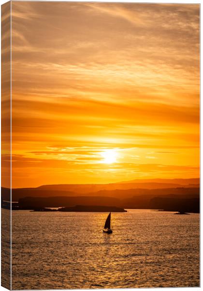 Sunset and a sail boat at Trearddur Bay  Canvas Print by Gail Johnson