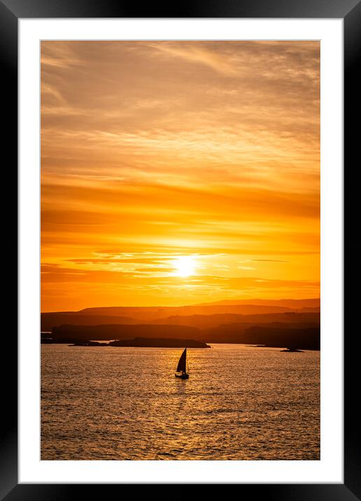 Sunset and a sail boat at Trearddur Bay  Framed Mounted Print by Gail Johnson