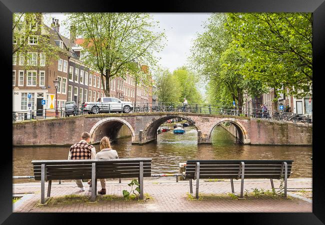 Couple on a bench by the Gentlemens Canal Framed Print by Jason Wells