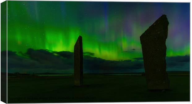 The aurora over the Standing Stones of Stenness, Orkney, Scotland. Canvas Print by Andrew Briggs
