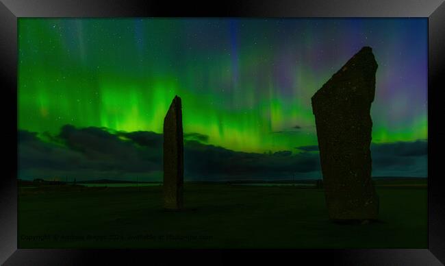 The aurora over the Standing Stones of Stenness, Orkney, Scotland. Framed Print by Andrew Briggs