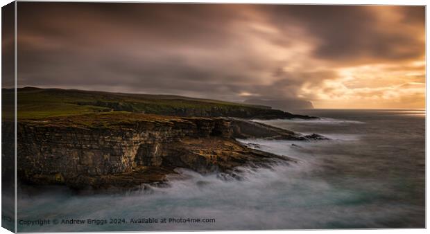 Sunset on the coast of Orkney, Scotland. Canvas Print by Andrew Briggs