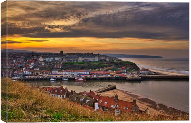Sunset in Whitby on the Yorkshire Coast, England. Canvas Print by Andrew Briggs