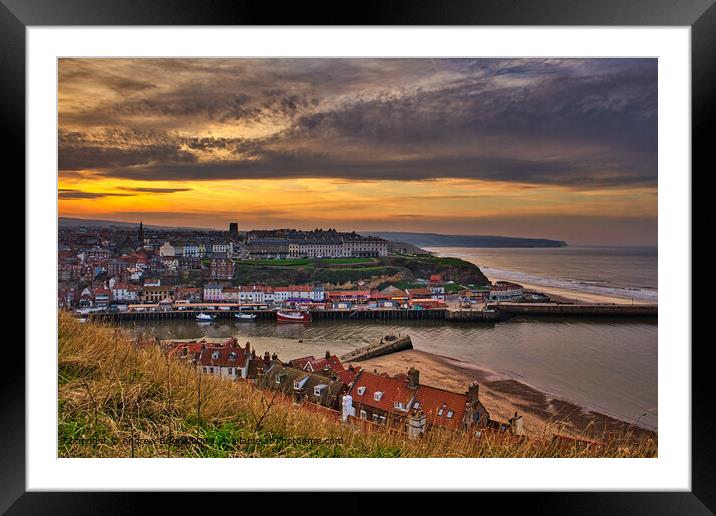 Sunset in Whitby on the Yorkshire Coast, England. Framed Mounted Print by Andrew Briggs