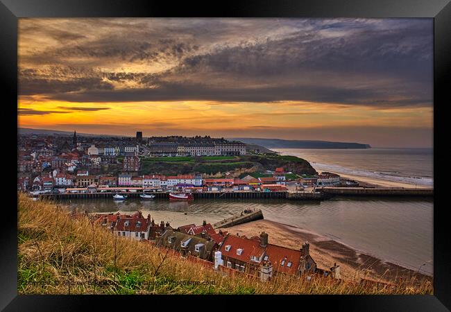 Sunset in Whitby on the Yorkshire Coast, England. Framed Print by Andrew Briggs