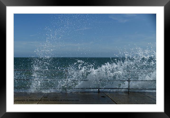 Wave breaking over the rail and concrete revetment at The Garrison, Shoeburyness, Essex. Framed Mounted Print by Peter Bolton