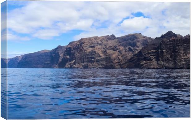 View of the mighty cliffs of Los Gigantes on Tenerife from the water side. Canvas Print by Michael Piepgras