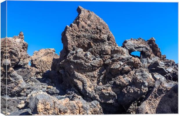 View of the impressive Mount Theide on Tenerife in its rocky surroundings. Canvas Print by Michael Piepgras