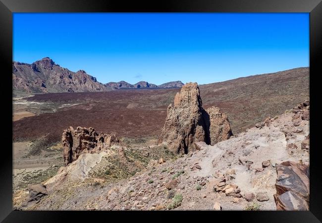 The majestic Roques de Garcia rocks on Tenerife on a beautiful sunny day. Framed Print by Michael Piepgras