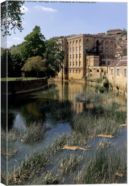 Abbey Mill across the River Avon from the town bridge in Bradford on Avon Canvas Print by Duncan Savidge