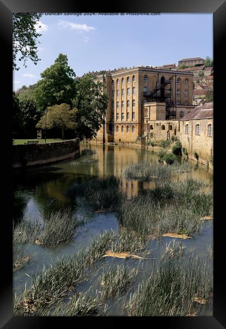 Abbey Mill across the River Avon from the town bridge in Bradford on Avon Framed Print by Duncan Savidge