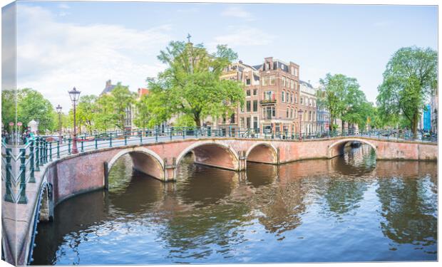 Prinsengracht and Reguliersgracht canal intersection Canvas Print by Jason Wells