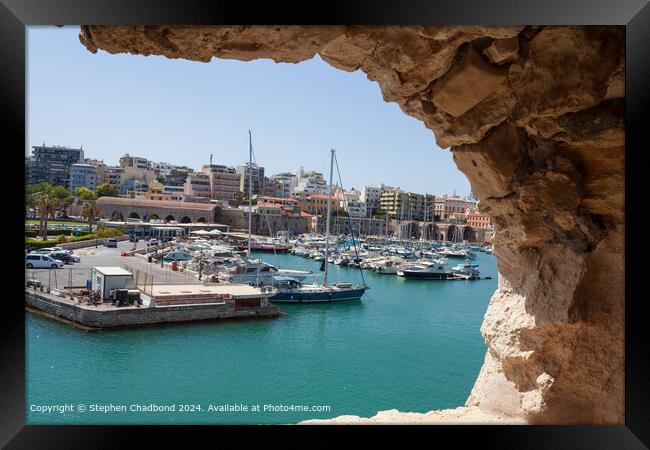 picturesque port viewed from an arch in the old fort at Heraklion Framed Print by Stephen Chadbond