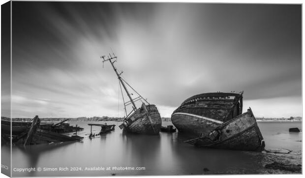 Black and white image of Pin Mill wrecks  Canvas Print by Simon Rich