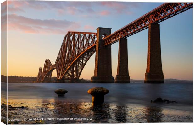 Sunset scene from the Forth Rail Bridge in Queensferry Scotland Canvas Print by Les McLuckie