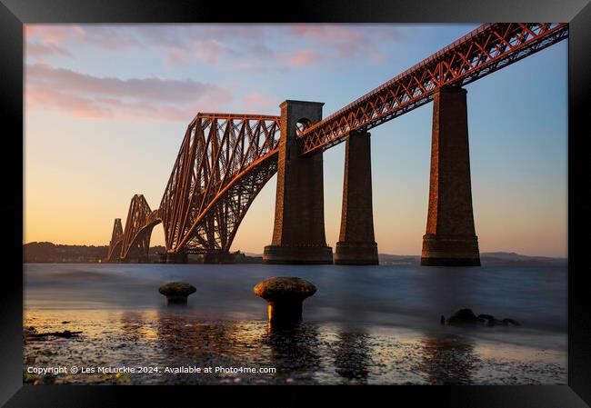 Sunset scene from the Forth Rail Bridge in Queensferry Scotland Framed Print by Les McLuckie